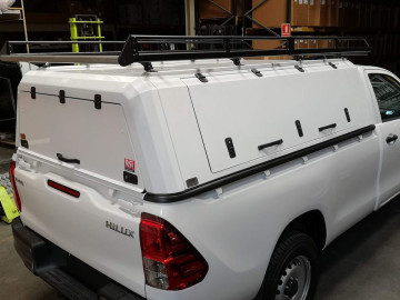 Barras de tejadilho reforçadas para hardtop com prolongamento sobre a cabina, defletor e rolo (SmartCap; cabine Extra)