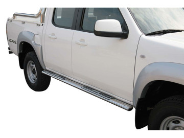 Estribos de secção oval em aço inoxidável com placas de rodagem. Tipo DSP (apenas 2009-2012; cabina dupla)